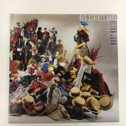 Elton John - Reg Strikes Back (LP, Album, Gat)