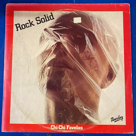 Chi-Chi Favelas And The Black And White Band - Rock Solid (LP, Album)
