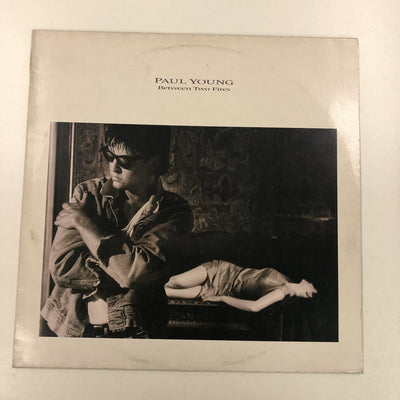 Paul Young - Between Two Fires (LP, Album)