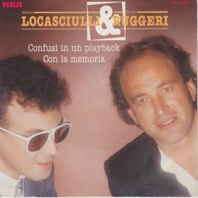 Mimmo Locasciulli & Enrico Ruggeri - Confusi In Un Playback / Con La Memoria (7")
