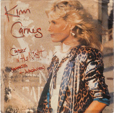 Kim Carnes - Crazy In The Night (Barking At Airplanes) / Oliver (Voice On The Radio) (7", Single)