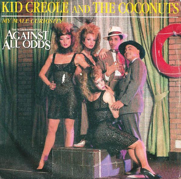 Kid Creole And The Coconuts - My Male Curiosity (7", Single)