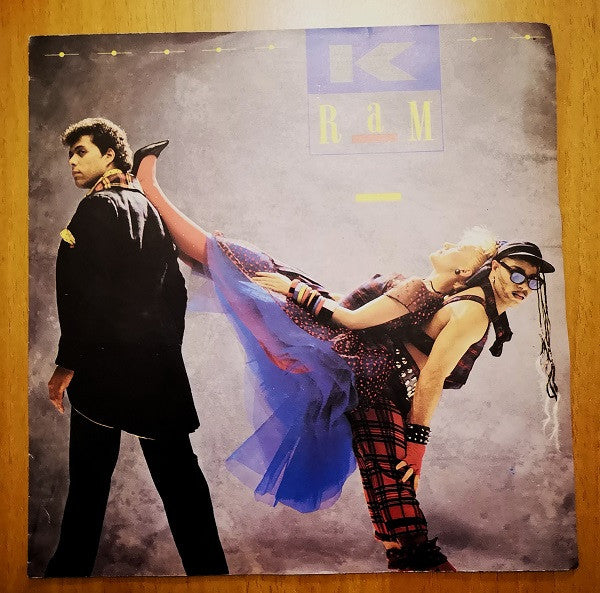 K-Ram - Ménage À Trois (7", Single)